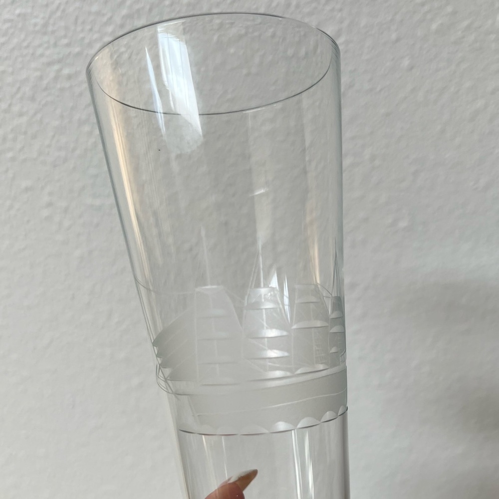 Set of cocktail glasses with sailboat motif etched